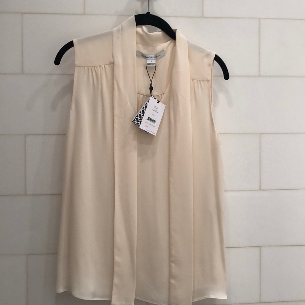 Cream Sleeveless Blouse